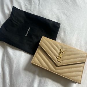 YSL CASSANDRE MATELASSÉ ENVELOPE CHAIN WALLET GRAIN DE POUDRE EMBOSSED LEATHER